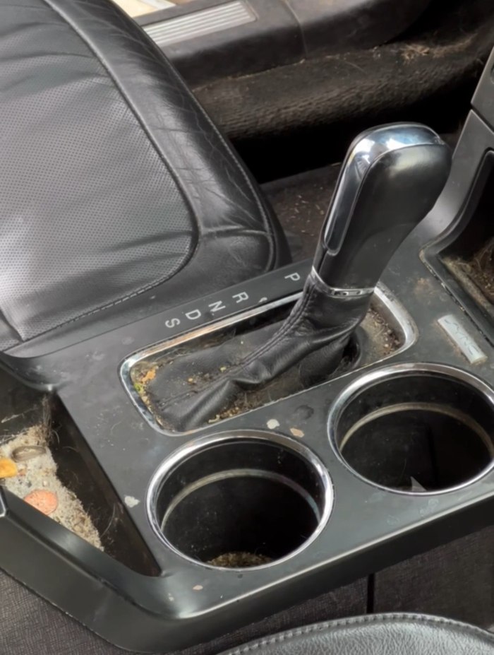 The same center console after a full interior detail